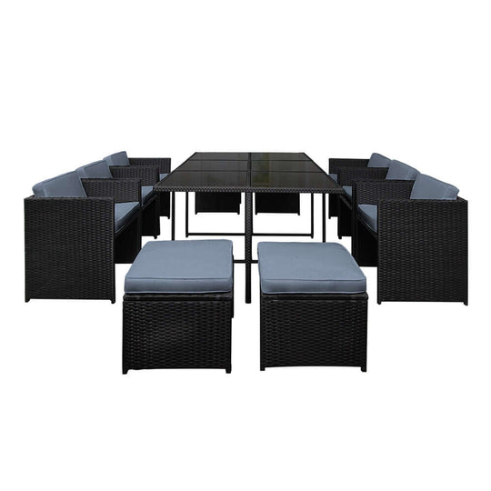 Gardeon 11-piece outdoor dining set with black wicker chairs and tempered glass table, cushioned seats for comfort.