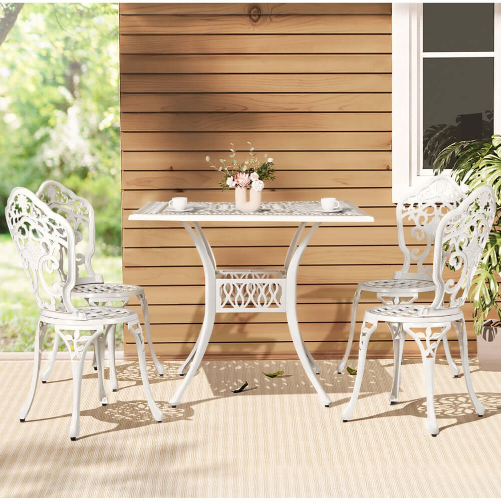 Gardeon 5-piece outdoor dining set in cast aluminum, featuring four white chairs and a table, ideal for patios and gardens.