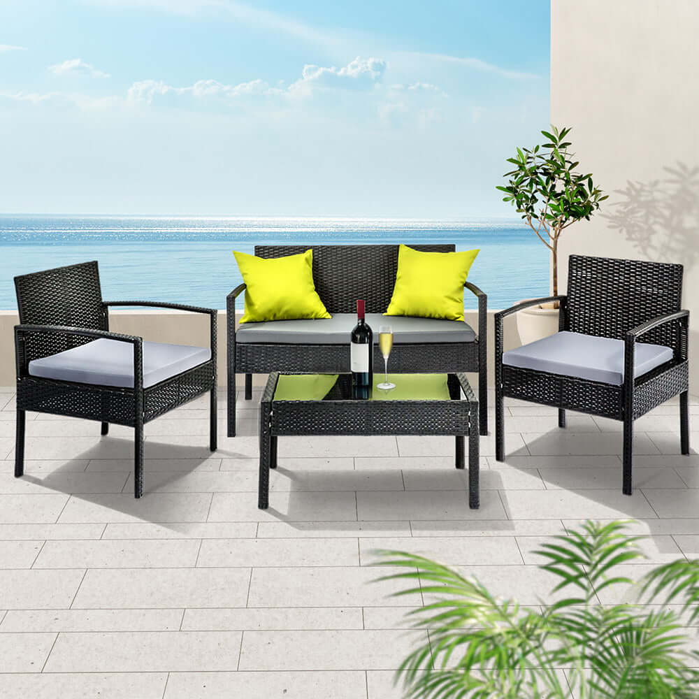 Affordable Gardeon outdoor sofa set with wicker chairs and table, perfect for stylish patio lounging.