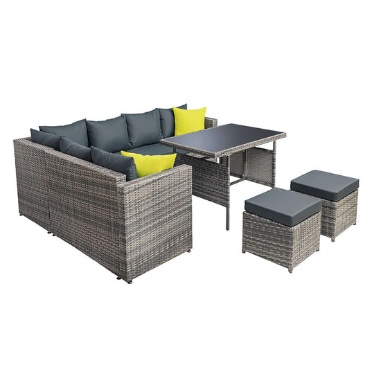 Gardeon outdoor dining set featuring grey wicker sofa, table, and cushions, perfect for stylish garden gatherings.