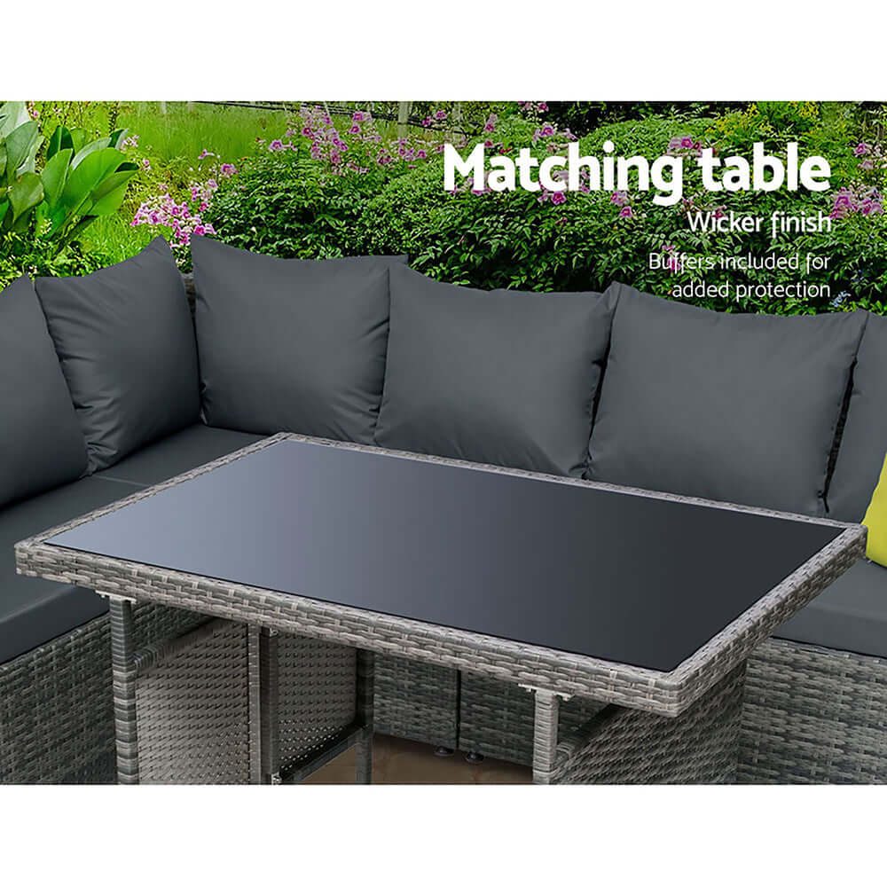 Gardeon outdoor dining set with wicker finish matching table and cushions, perfect for affordable backyard gatherings.