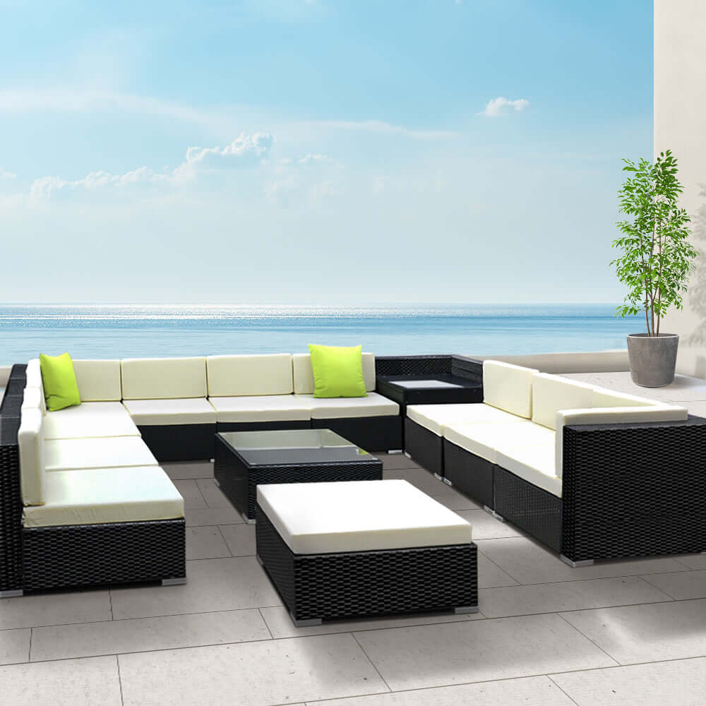 Gardeon 13-piece outdoor wicker sofa set in stylish black and white, perfect for luxurious leisure and durability.