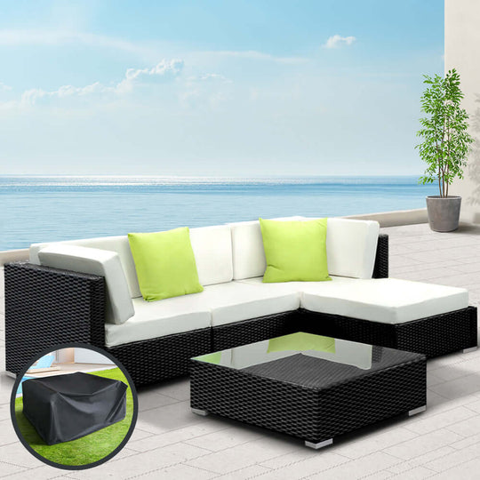 Gardeon 5-piece outdoor sofa set with green cushions and glass table, UV-resistant for affordable luxury.