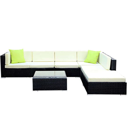 Gardeon 7-piece outdoor sofa set in black wicker with green cushions and glass table. Affordable quality lounge for DIY lovers.