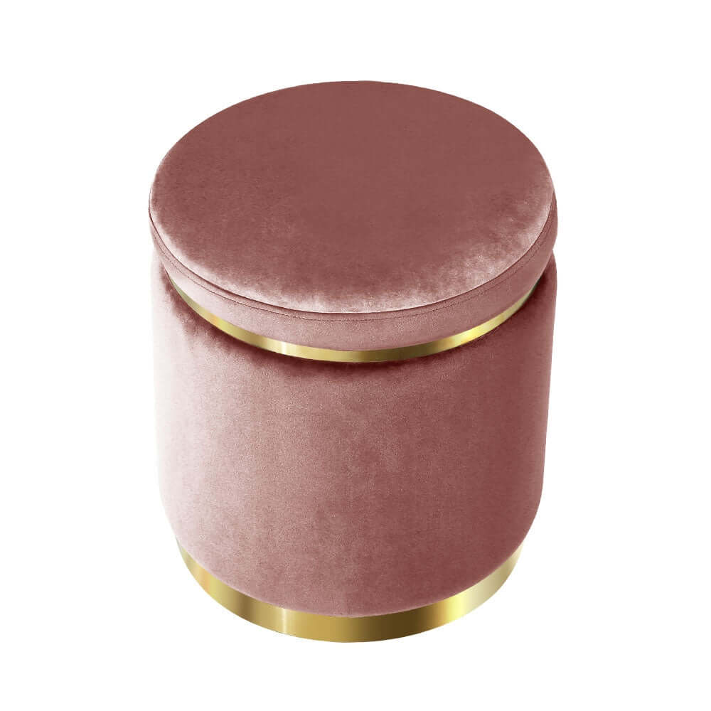 Round velvet pink footstool with gold trim for a luxe touch in your lounge room.