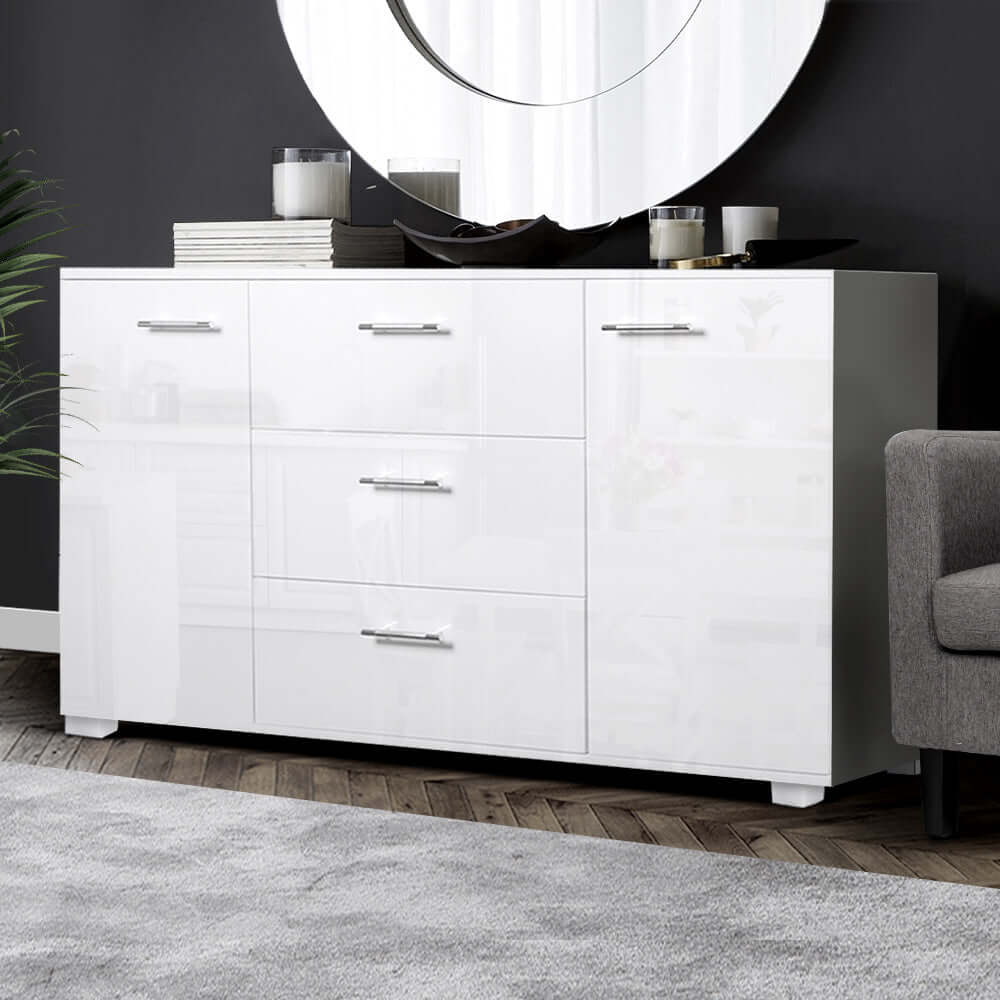 White high gloss Artiss buffet sideboard with three drawers and two cupboards, offering modern style storage in a living room setting.