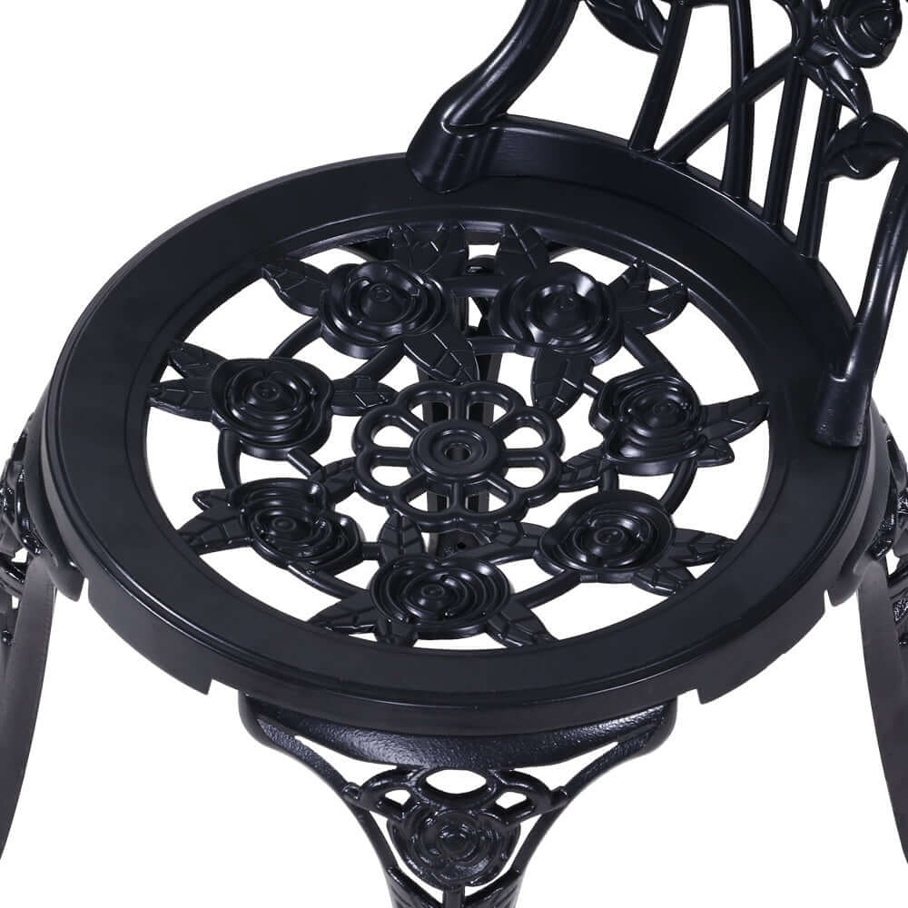 Close-up of Gardeon Bistro Set chair showcasing intricate rose design, crafted from durable cast aluminum in a sleek black finish.