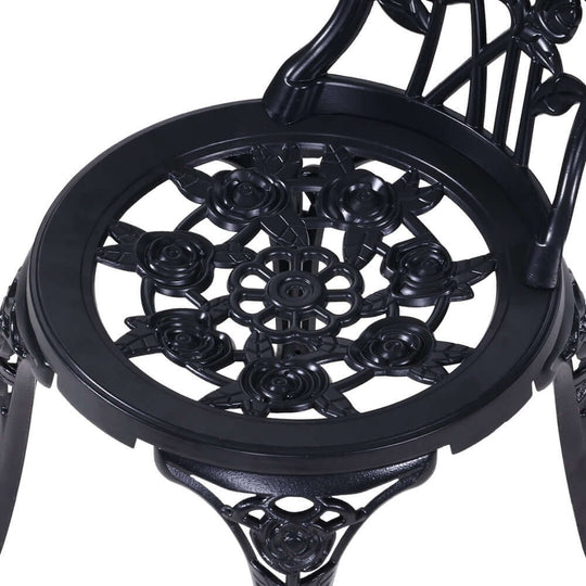 Close-up of Gardeon Bistro Set chair showcasing intricate rose design, crafted from durable cast aluminum in a sleek black finish.