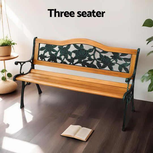 Gardeon three-seater garden bench with wooden seat and rose-patterned cast iron backrest, perfect for outdoor spaces.