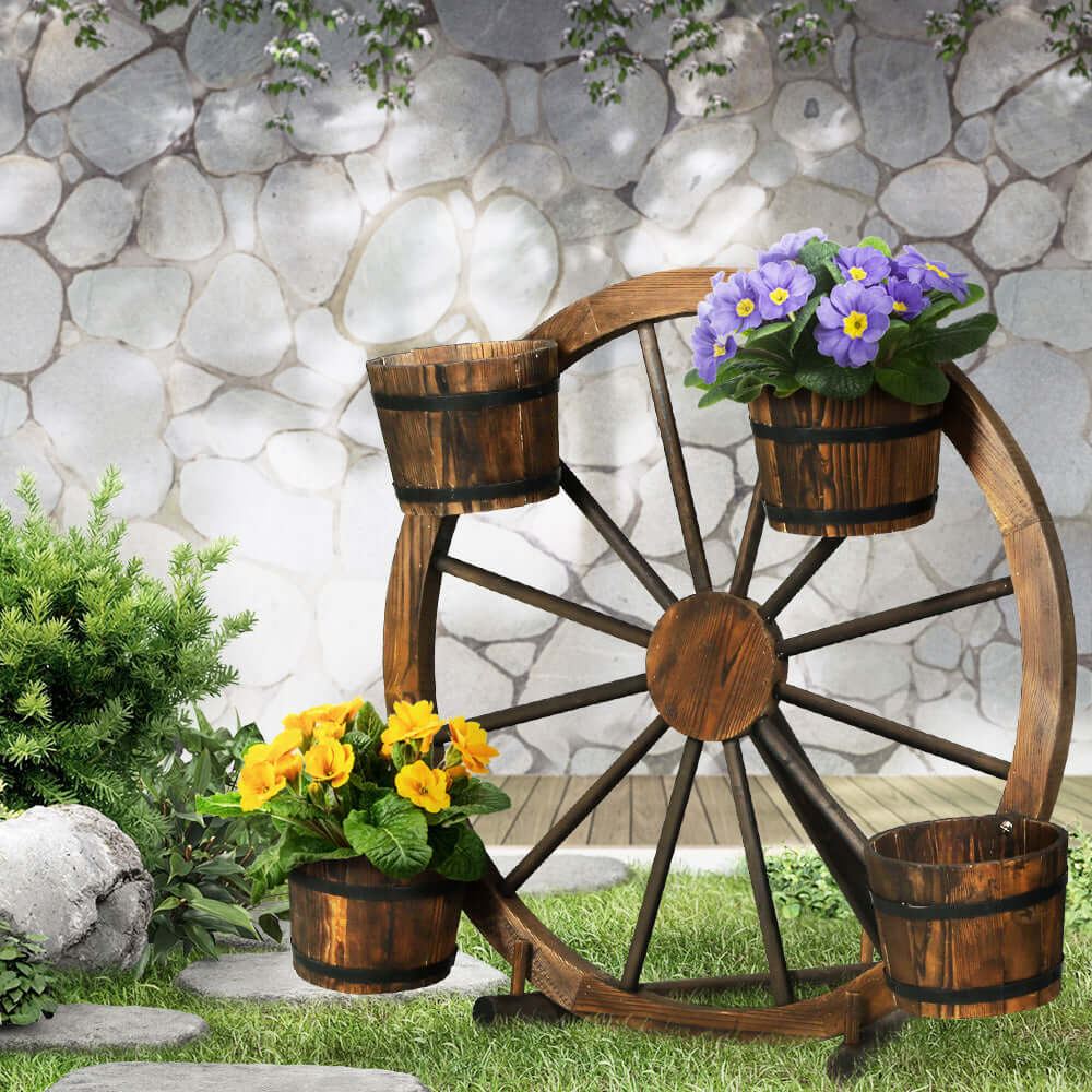 Gardeon wooden garden wheel plant stand featuring flowers, rustic outdoor decor for affordable garden enhancement.