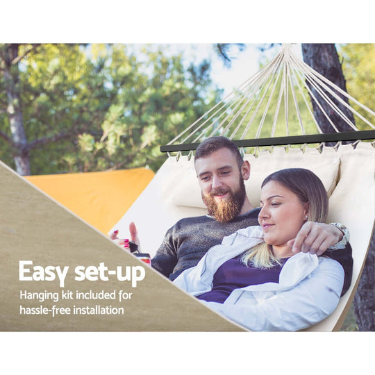 Couple relaxing in Gardeon hammock, showcasing easy setup and hanging kit for hassle-free outdoor enjoyment.