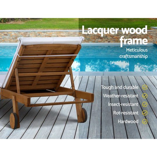 Lacquer wood sun lounge with wheels near pool, showcasing durability and weather resistance for outdoor relaxation.