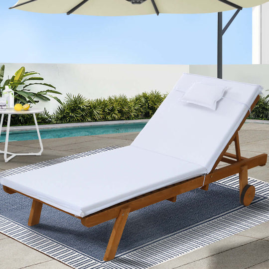 Gardeon sun lounge white wooden outdoor lounger on patio, perfect for relaxation and sunbathing.