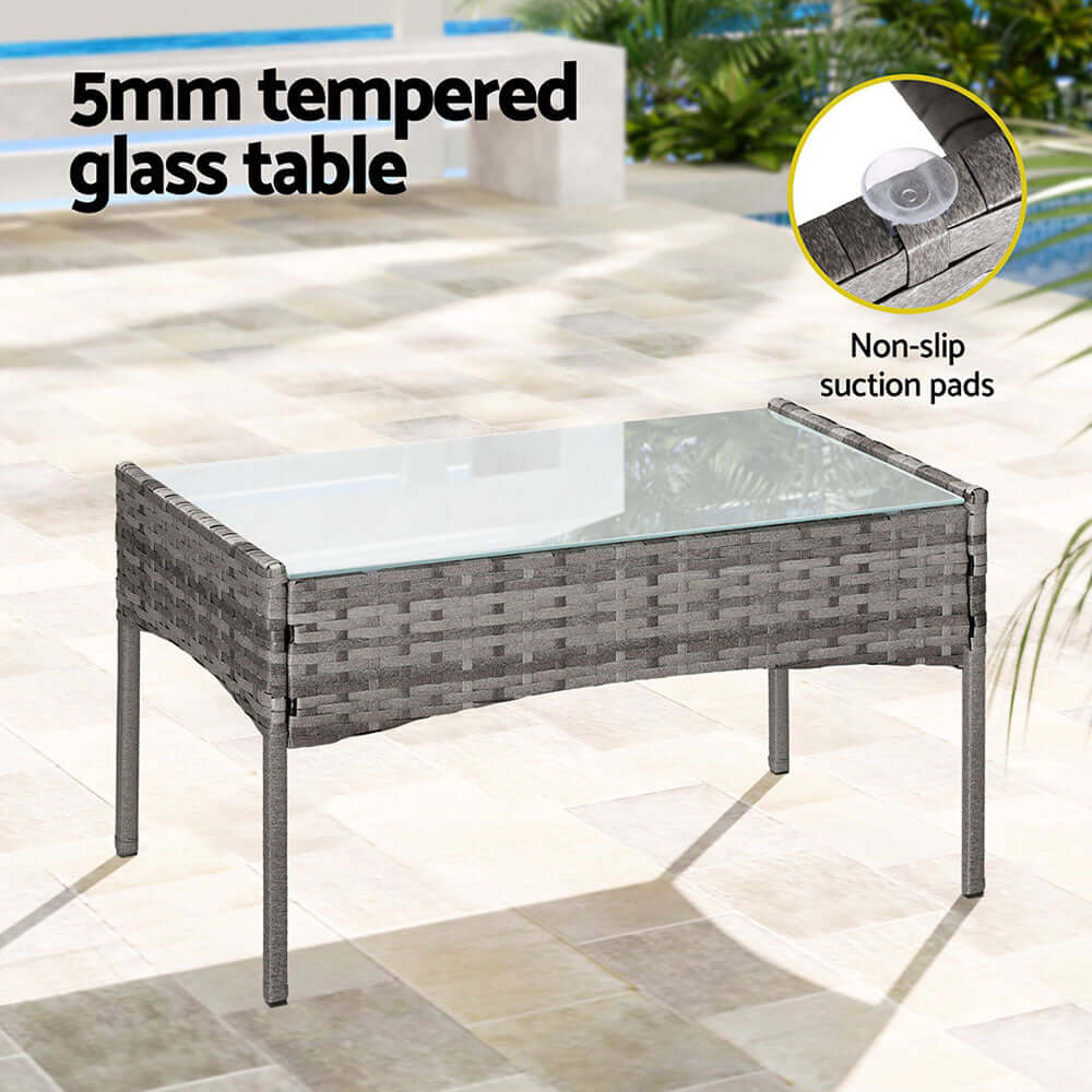 5mm tempered glass table with non-slip suction pads and wicker finish, perfect for outdoor lounging.