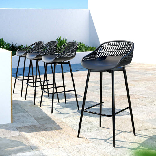 Gardeon 4-piece outdoor bar stools with black polypropylene seats and metal frames for stylish balcony dining.