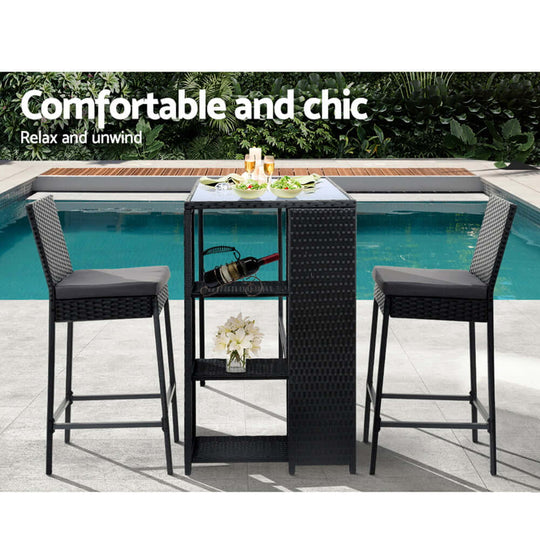 Gardeon affordable 3-piece outdoor bar set with chic wicker table and stools by poolside for stylish relaxation.