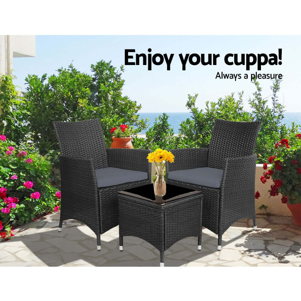 Gardeon black wicker outdoor bistro set with two chairs and table on a sunny patio, perfect for affordable relaxation.