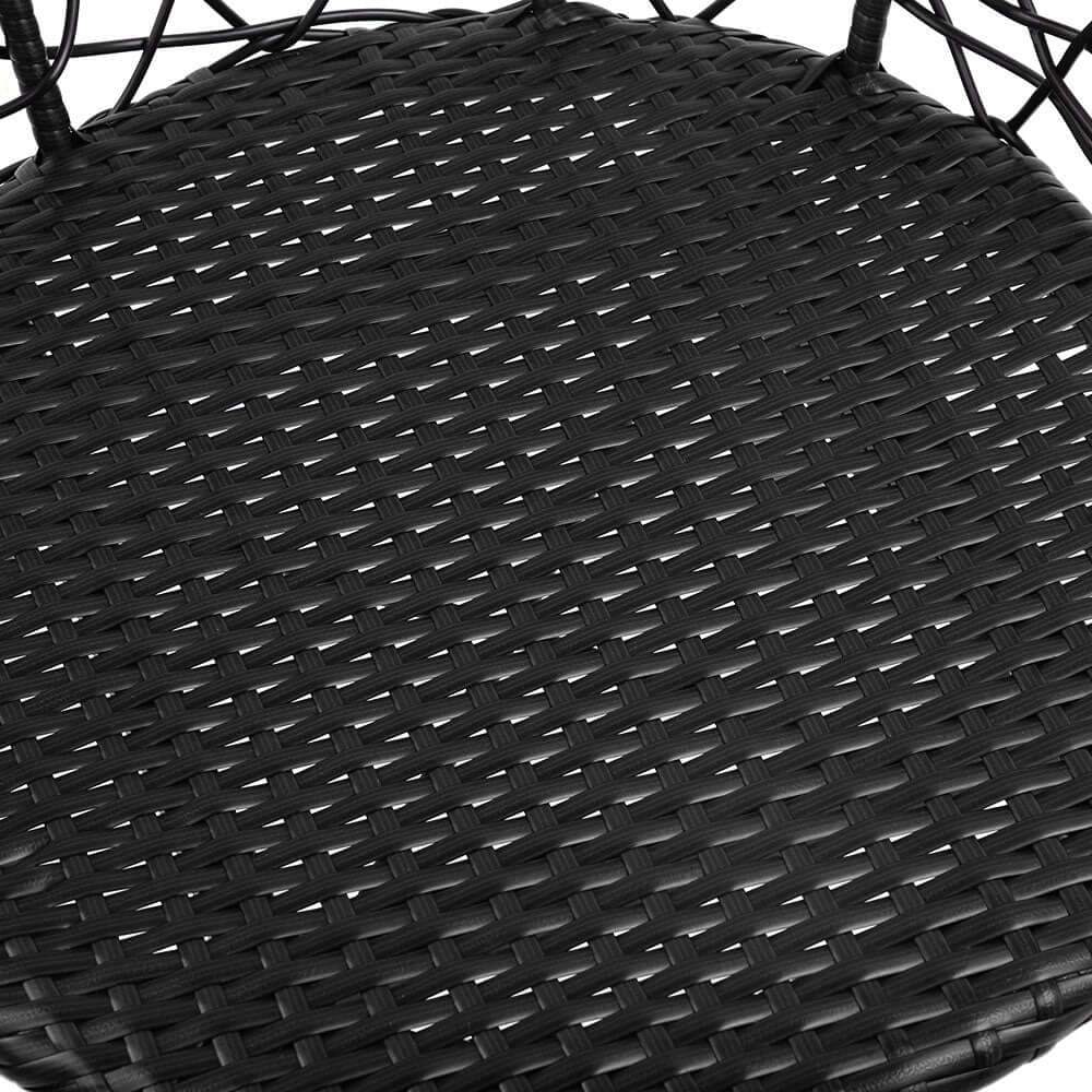 Close-up of black woven rattan chair seat, showcasing quality craftsmanship and comfortable design for outdoor furniture.