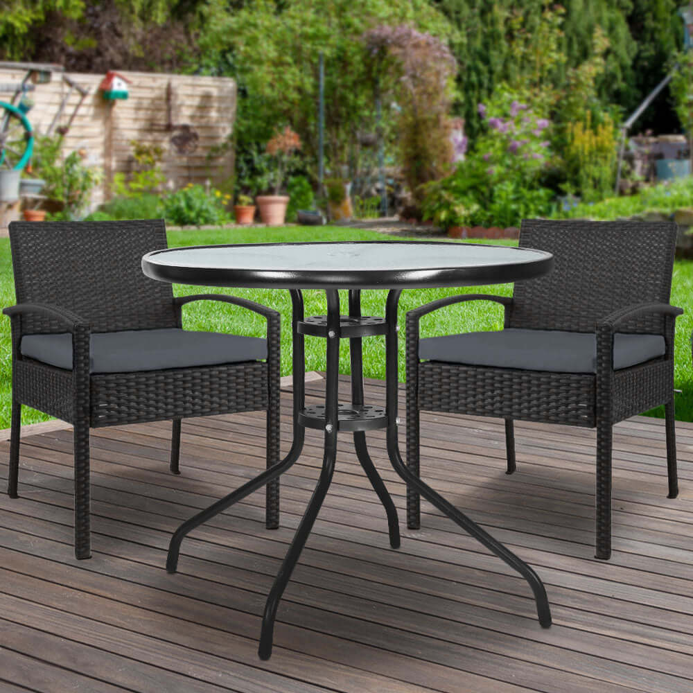 Gardeon 3PC outdoor bistro set with rattan table and chairs on a patio, perfect for quality dining and socializing.