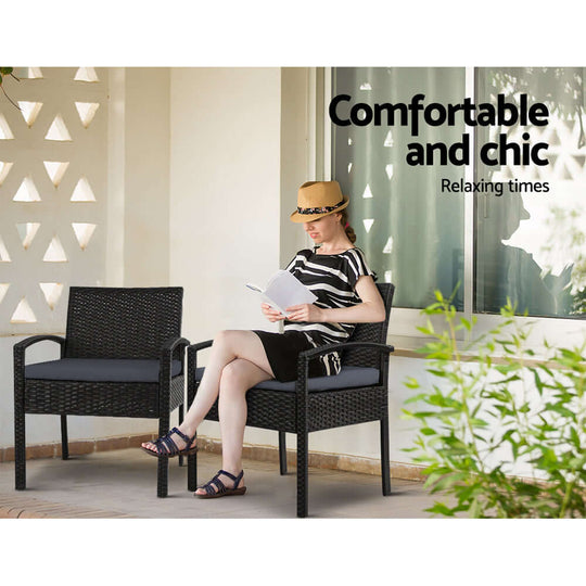 Woman reading on stylish wicker chairs in a chic outdoor setting, showcasing affordable comfort.