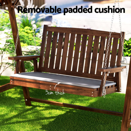 Gardeon outdoor wooden swing chair with removable padded cushion, 3cm thick, ideal for relaxation and comfort in the garden.