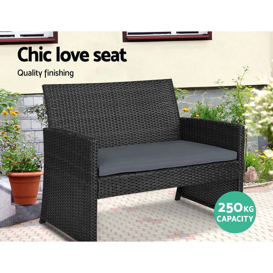 Gardeon chic black wicker love seat with durable cushion, 250kg capacity, quality finishing in outdoor setting.