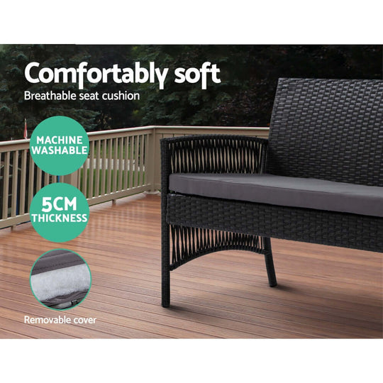 Gardeon wicker outdoor sofa set showing comfortable, machine washable seat cushion with removable cover on a wooden deck.