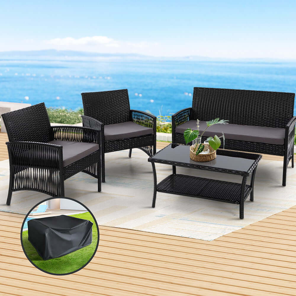 Gardeon 4-piece outdoor sofa set in black wicker, featuring armchairs and a table on a patio, includes storage cover.