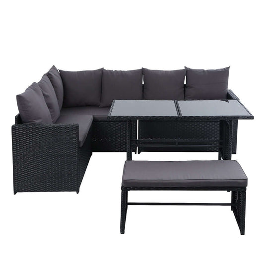 Gardeon 8-seater outdoor dining lounge set in black wicker with cushions, perfect for garden gatherings.