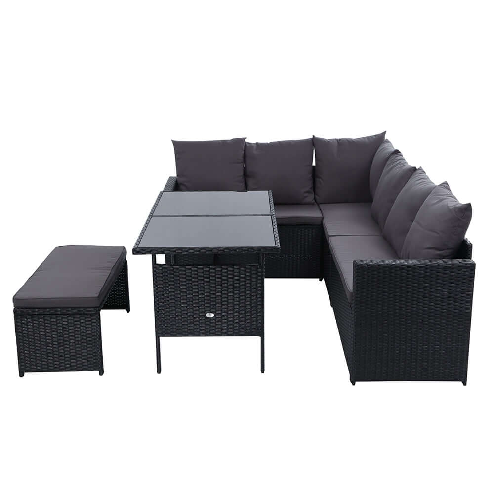 Gardeon affordable outdoor dining set with black sofa, table, and bench, perfect for garden parties and relaxation.