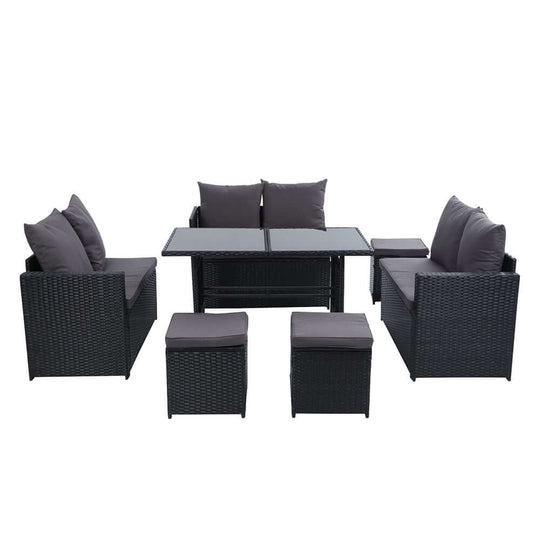 Gardeon 9-seater outdoor wicker sofa dining set, black with cushions, perfect for luxury garden gatherings.