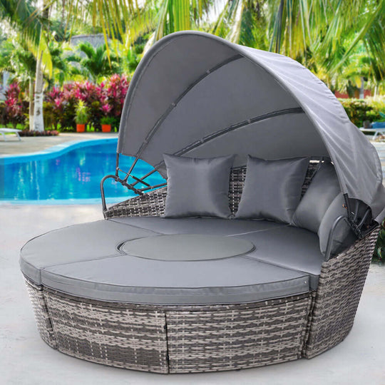 Gardeon sun lounge setting in grey, perfect for outdoor relaxation by the pool with weather-resistant design.