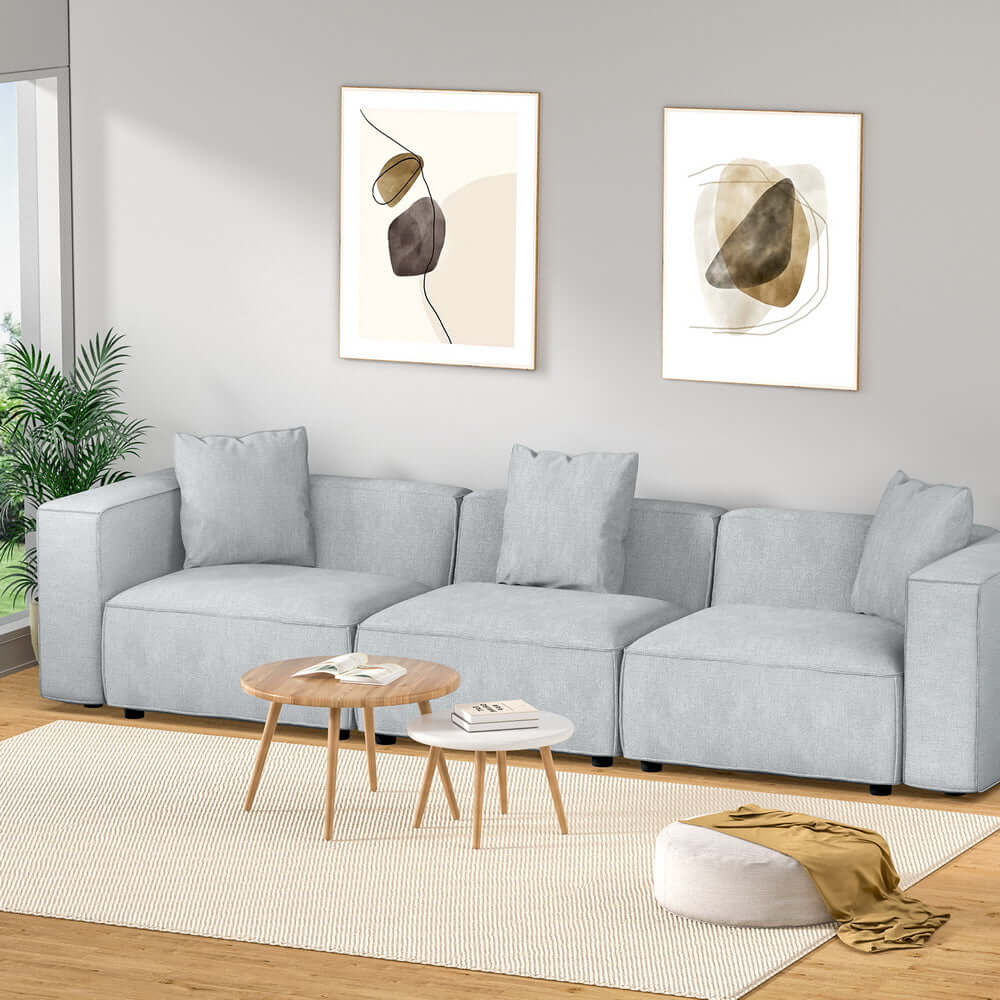 Artiss Modular Sofa Chaise Set 3-Seater Grey in modern living room setting with artwork.