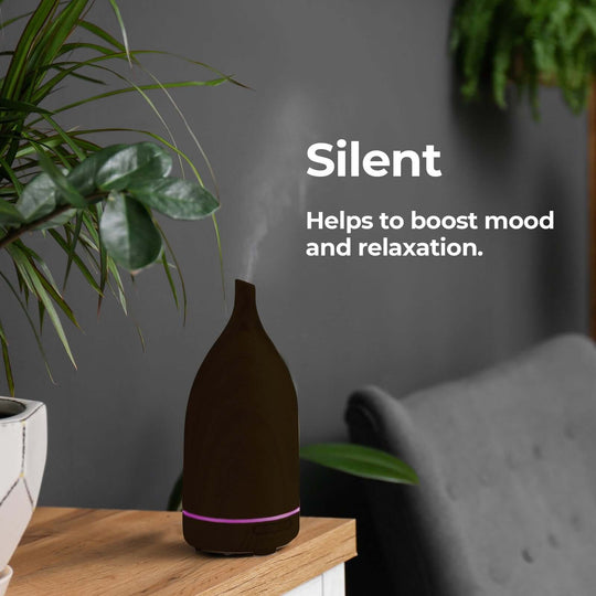 Milano Decor 100ml Ultrasonic Aroma Diffuser in dark wood, promoting relaxation and mood enhancement.