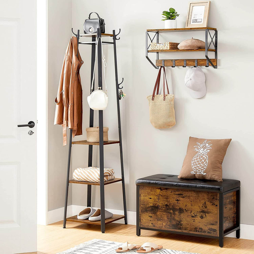 Rustic brown and black coat rack with three shelves and hooks, stylish storage for jackets and bags in an entryway.