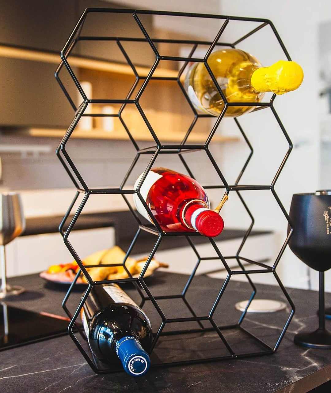 Sleek modern 14-bottle countertop wine rack in black metal, featuring a geometric design with wine bottles displayed. Affordable luxury for any space.