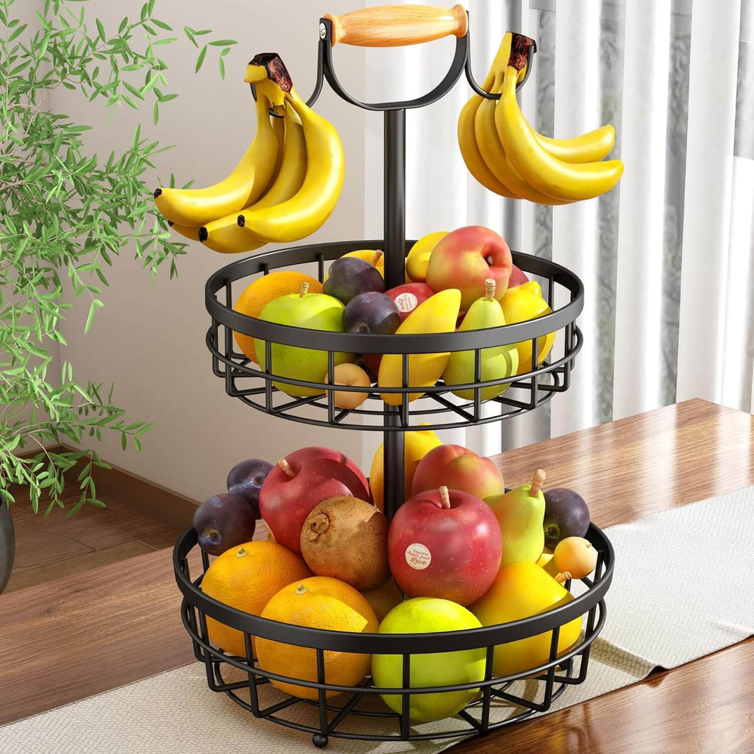 2-tier fruit basket bowl with wood handle and banana hangers, organized storage for fresh fruits and vegetables in kitchen.