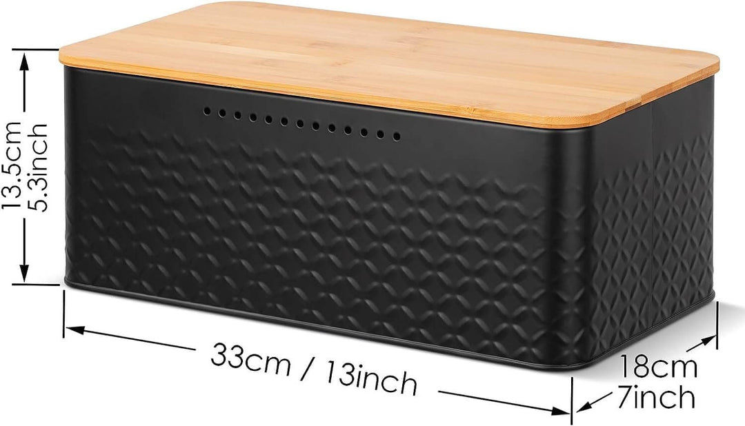 Stylish black bread bin with bamboo lid, doubles as a chopping board, ideal for kitchen storage and organization.