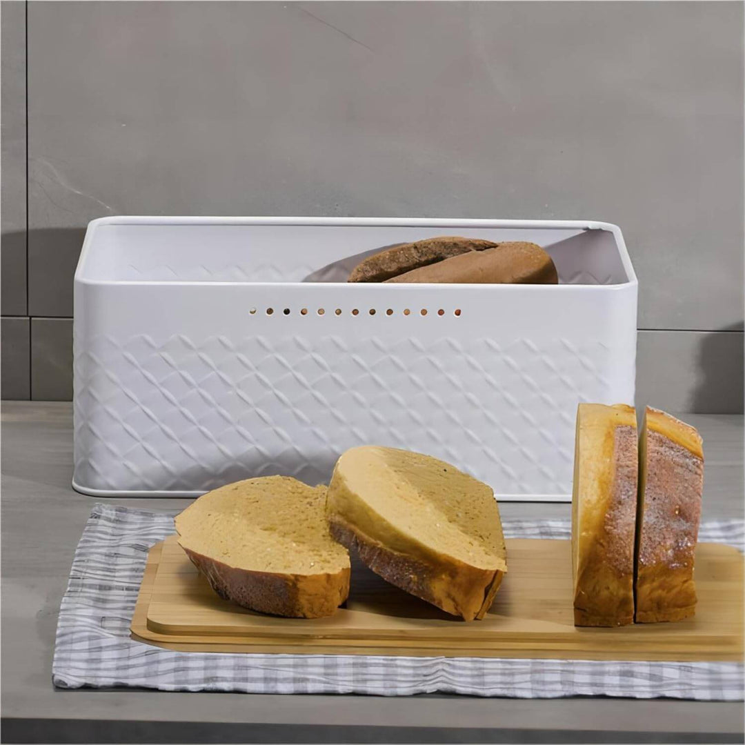 Stylish bread bin with bamboo lid and sliced bread on countertop, affordable kitchen storage solution.