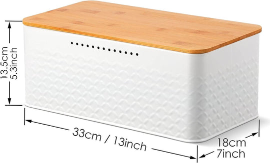 Stylish bread bin with bamboo lid used as chopping board, sleek design for kitchen countertop storage.