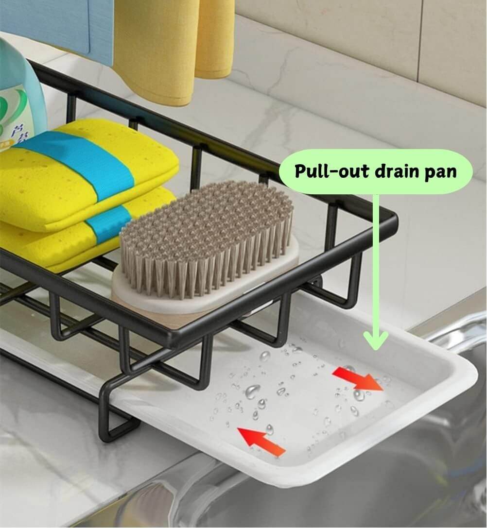 Sink caddy showing pull-out drain tray, sponge, and brush on a kitchen countertop for tidy storage solutions.