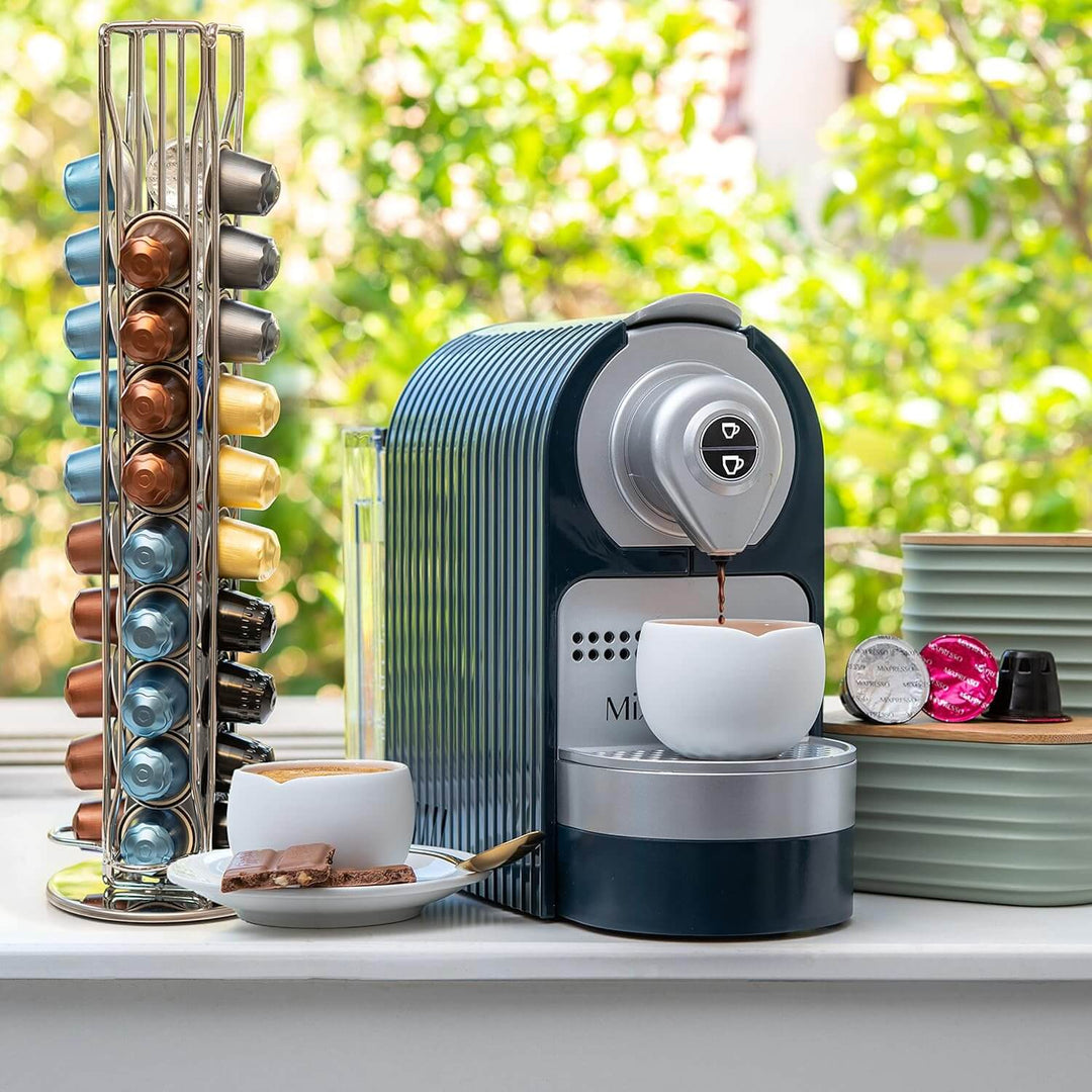 Affordable coffee pods holder with Nespresso machine and assorted coffee pods displayed, perfect for DIY coffee lovers.