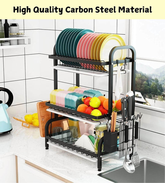 3-tier dish drying rack in kitchen with plates, utensils, and fruits; made from high quality carbon steel, affordable and functional.