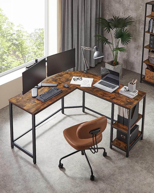 L-shaped computer desk corner setup with dual monitors, laptop, and two-shelf storage solution offering a balance of convenience, value, and quality furniture