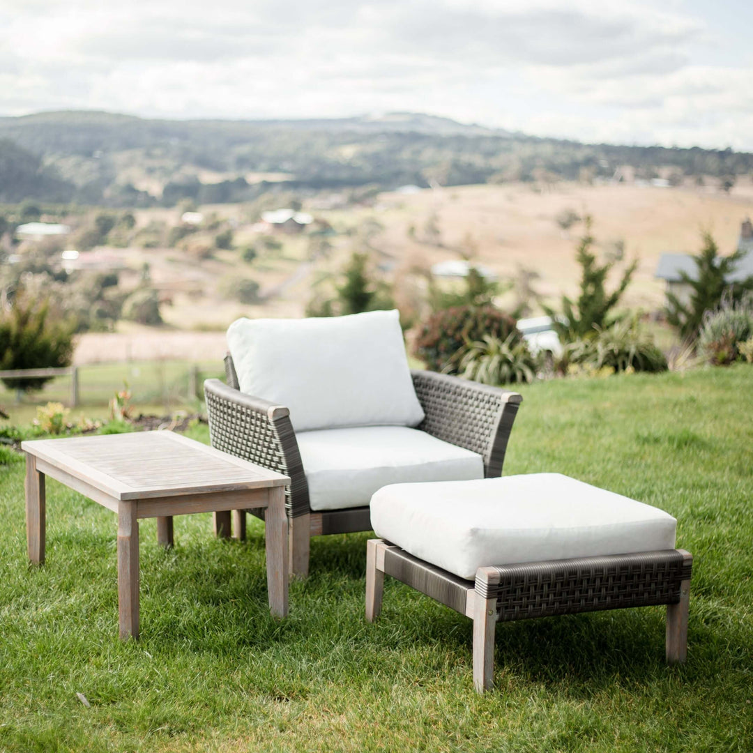 Paradise 3-piece furniture set for outdoor relaxation, featuring a sofa armchair, footrest ottoman, and coffee table.