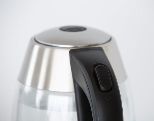 Close-up of Healthy Choice 1.7 Litre Glass Kettle handle with 360° rotational base. Affordable, quality value furniture kitchen appliance.