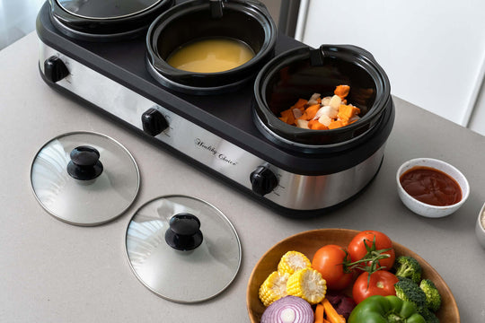 3-Pot Slow Cooker with ingredients and vegetables, showcasing affordable, quality home cooking solutions.