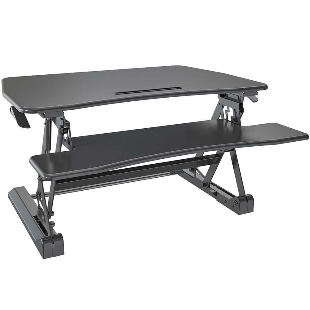 Fortia Desk Riser in black, adjustable height for dual monitor use, promoting comfort for home or office work.