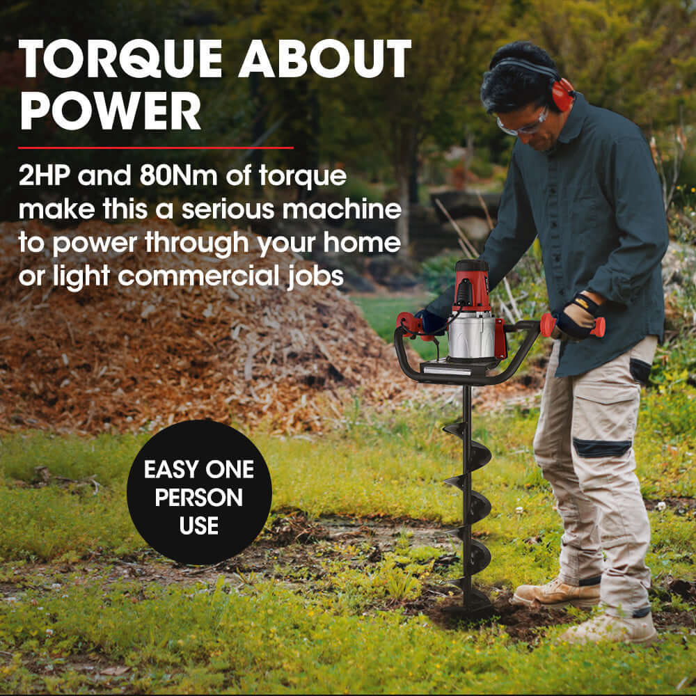 Person using a Baumr-AG electric post hole auger, showcasing its torque power for DIY and commercial tasks.