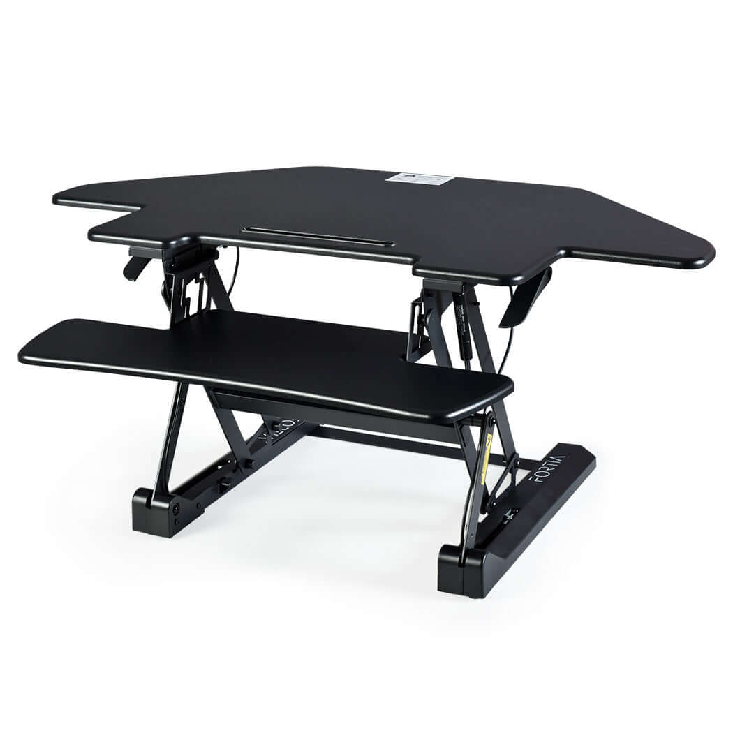 Fortia Corner Desk Riser in black, adjustable height for dual monitor use and ergonomic home office setup.